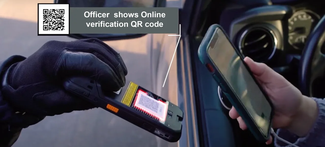 Officer presenting an online verification QR code on a handheld while a driver scans it with their phone at a traffic stop